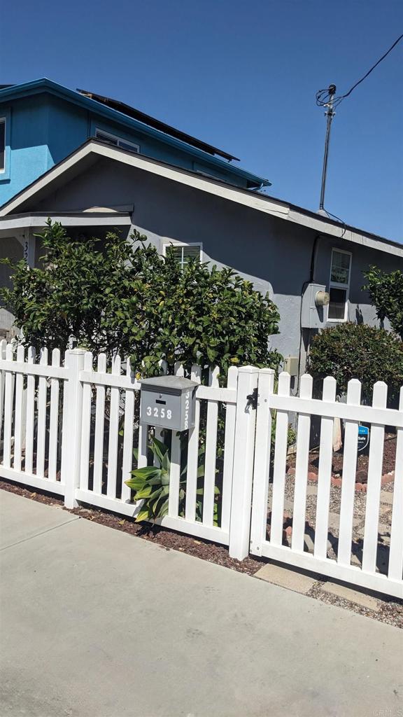 3258 Tyler Street Carlsbad, CA 92008 - Photo 21 of 27 a front view of a house with a street