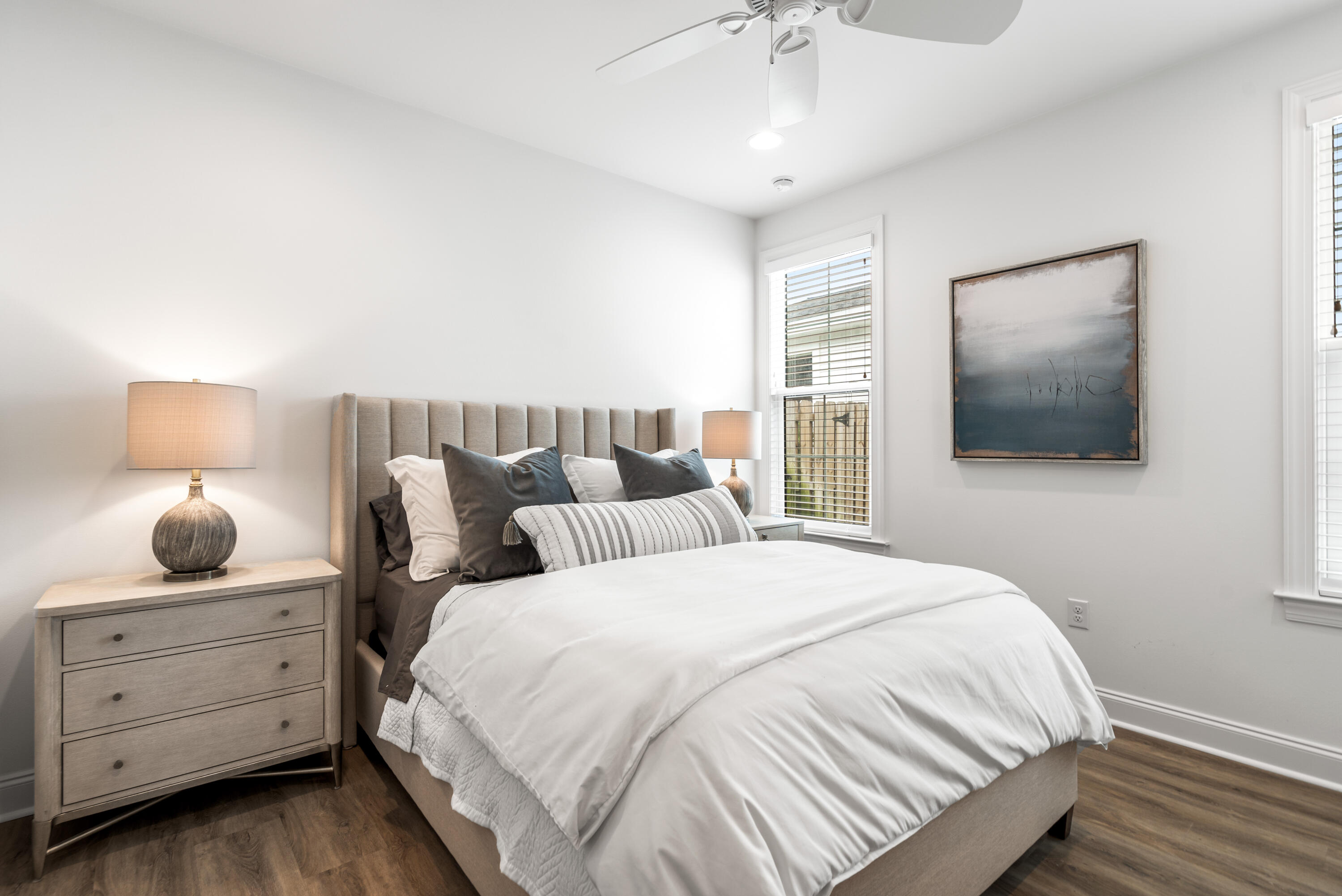 99 Roundwood Dr Inlet Beach Inlet Beach, FL 32461 - Photo 13 of 24 a bedroom with a bed and a flat tv screen on dresser