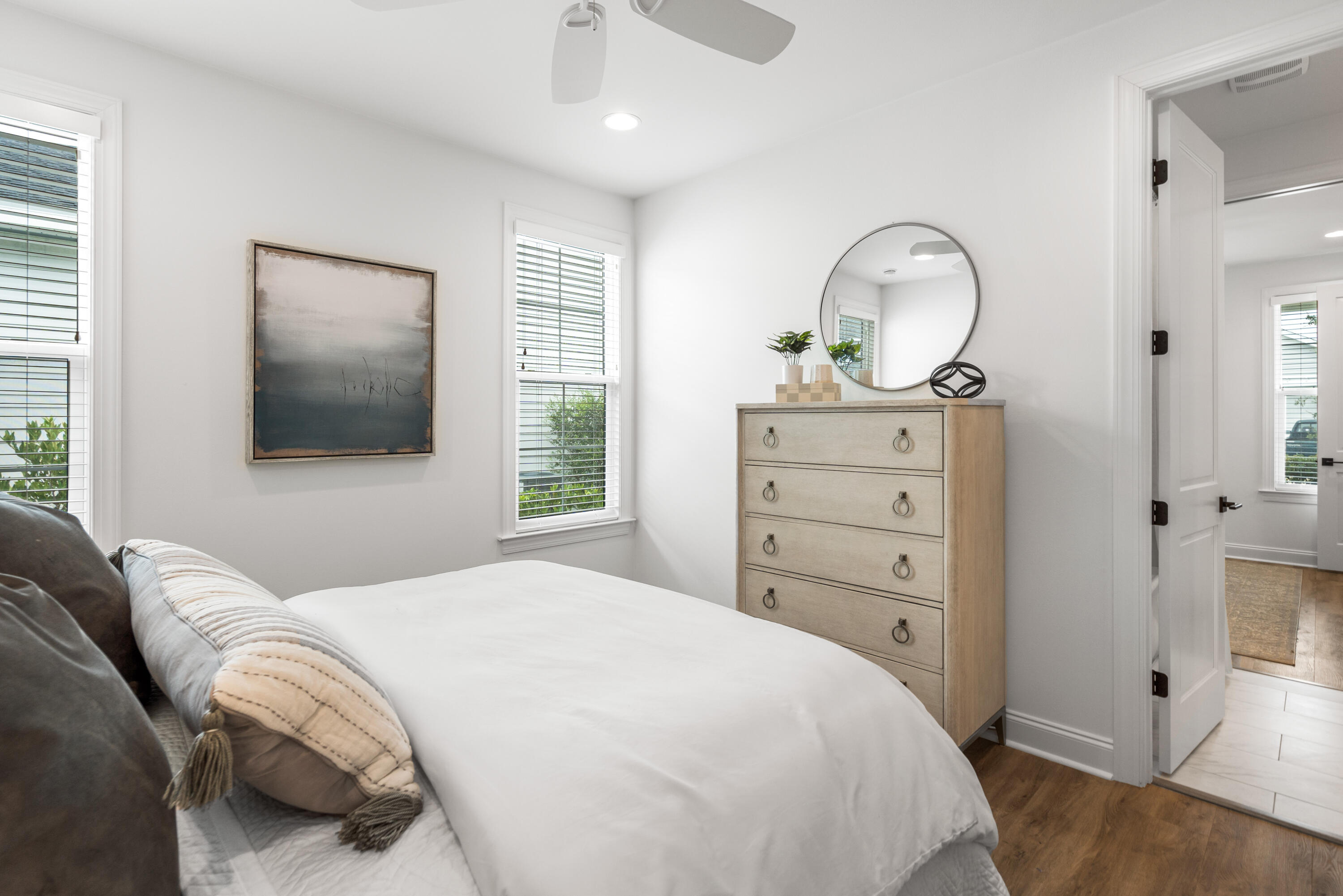 99 Roundwood Dr Inlet Beach Inlet Beach, FL 32461 - Photo 14 of 24 a bedroom with a bed and a dresser