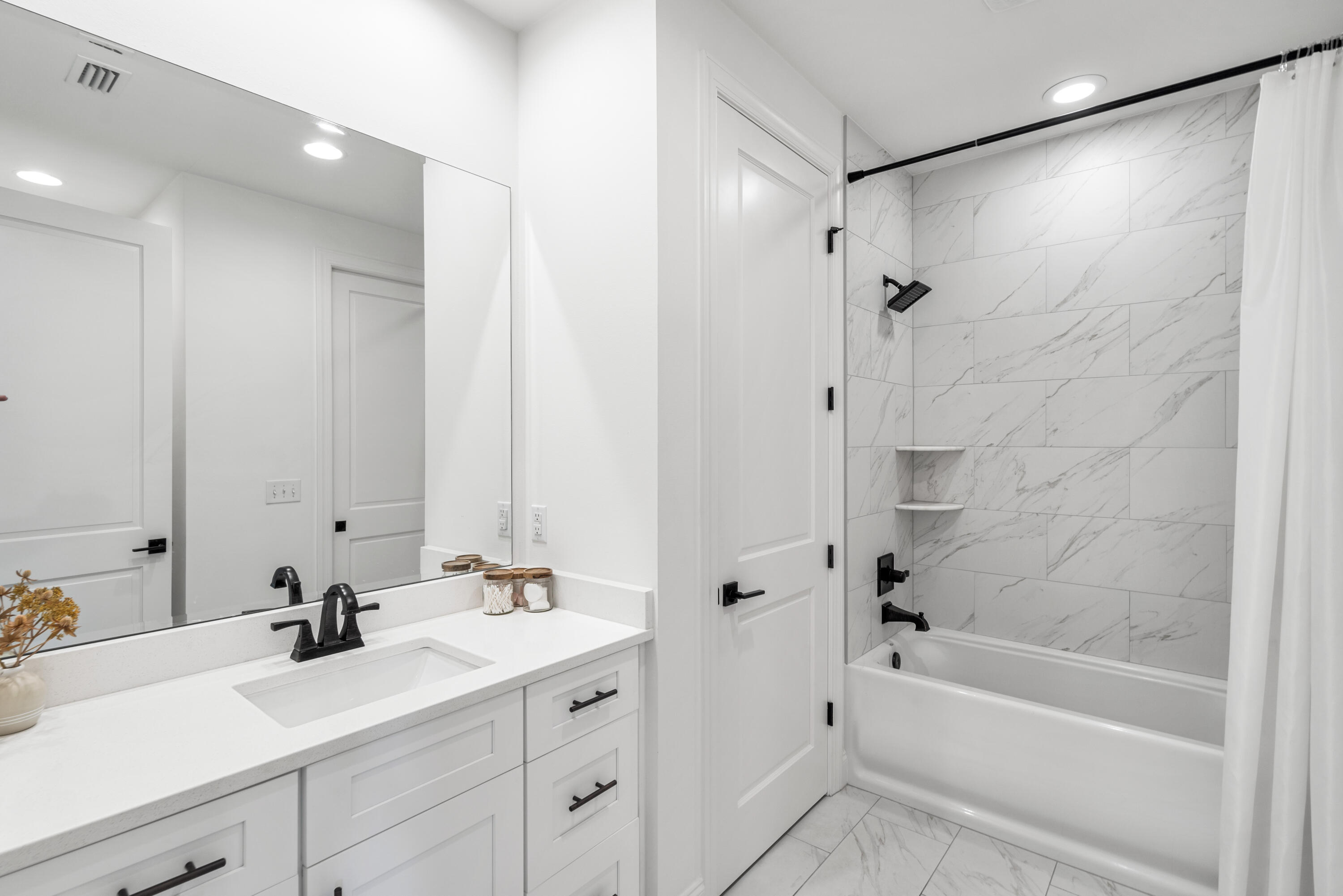 99 Roundwood Dr Inlet Beach Inlet Beach, FL 32461 - Photo 16 of 24 a bathroom with a tub shower sink vanity granite and mirror