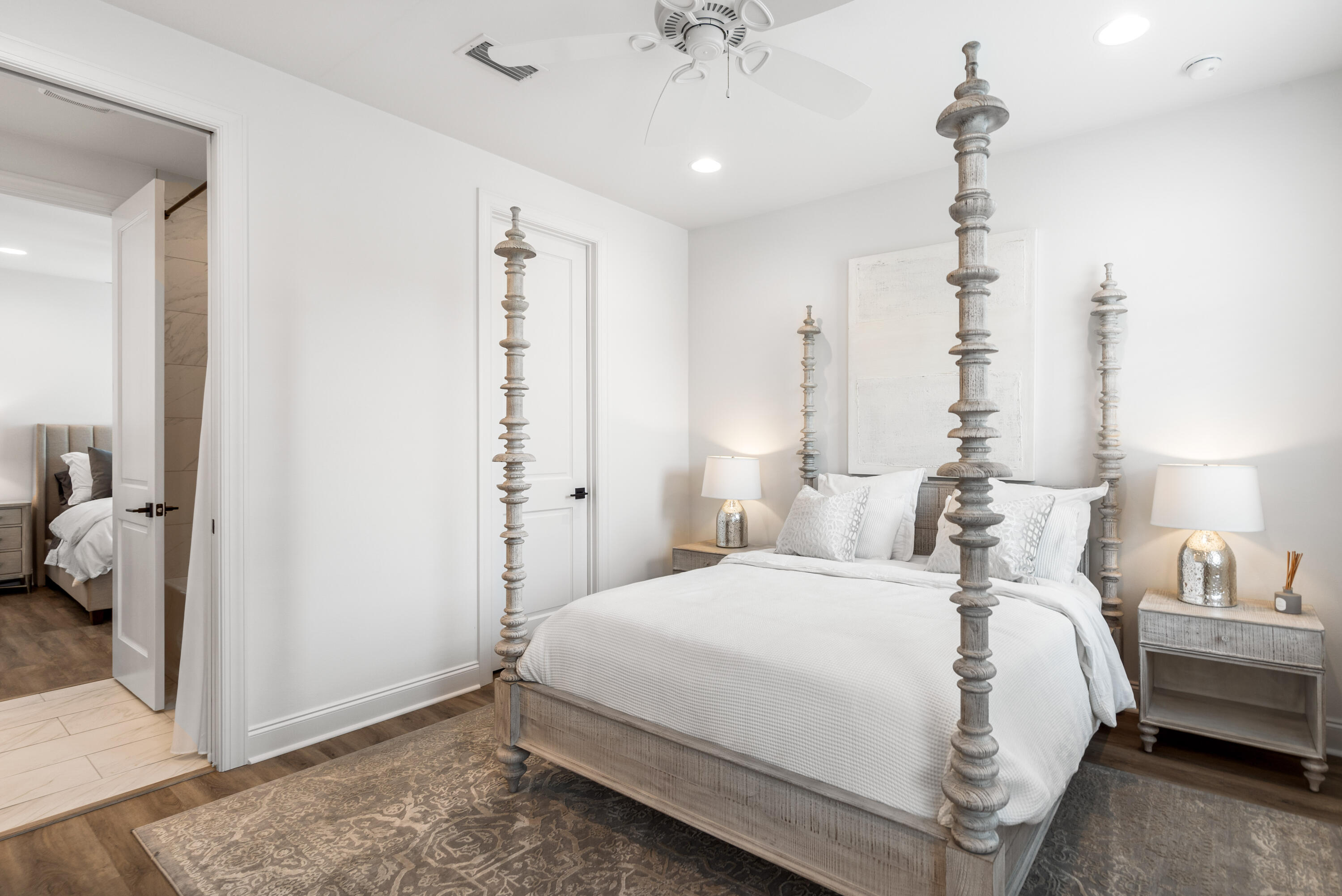 99 Roundwood Dr Inlet Beach Inlet Beach, FL 32461 - Photo 17 of 24 a bedroom with a bed and a chandelier