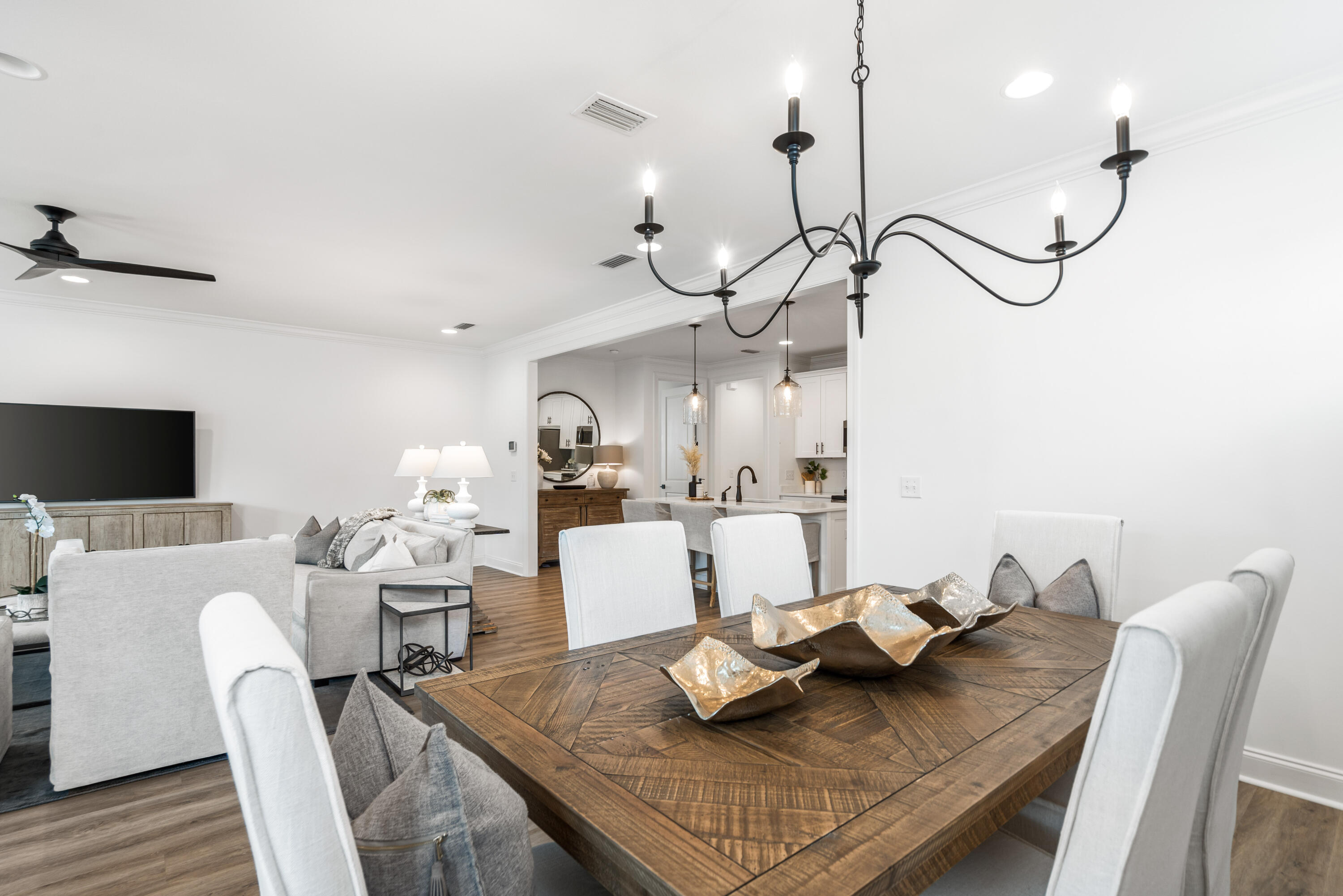 99 Roundwood Dr Inlet Beach Inlet Beach, FL 32461 - Photo 2 of 24 a living room with furniture a flat screen tv and a table