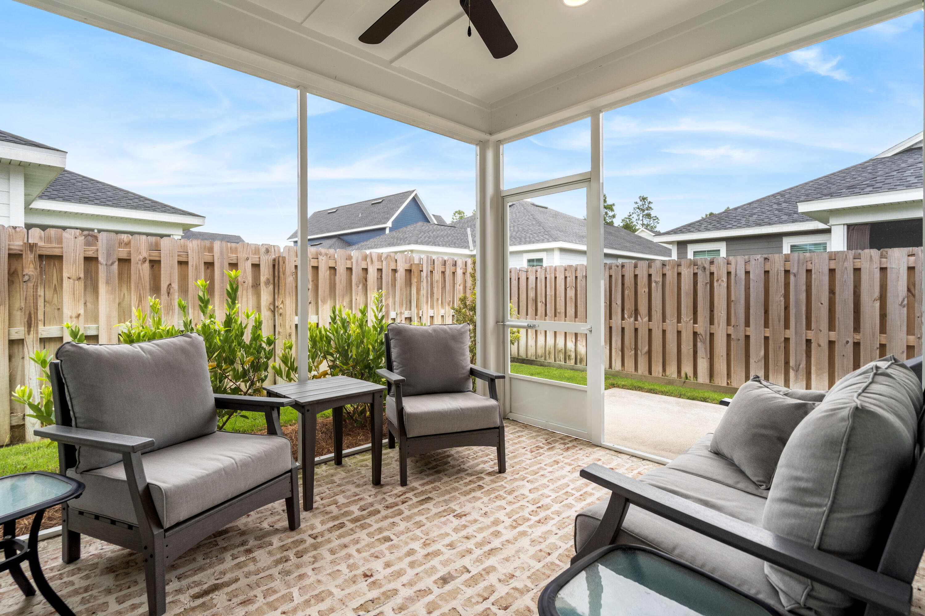 99 Roundwood Dr Inlet Beach Inlet Beach, FL 32461 - Photo 21 of 24 a living room with furniture and a large window