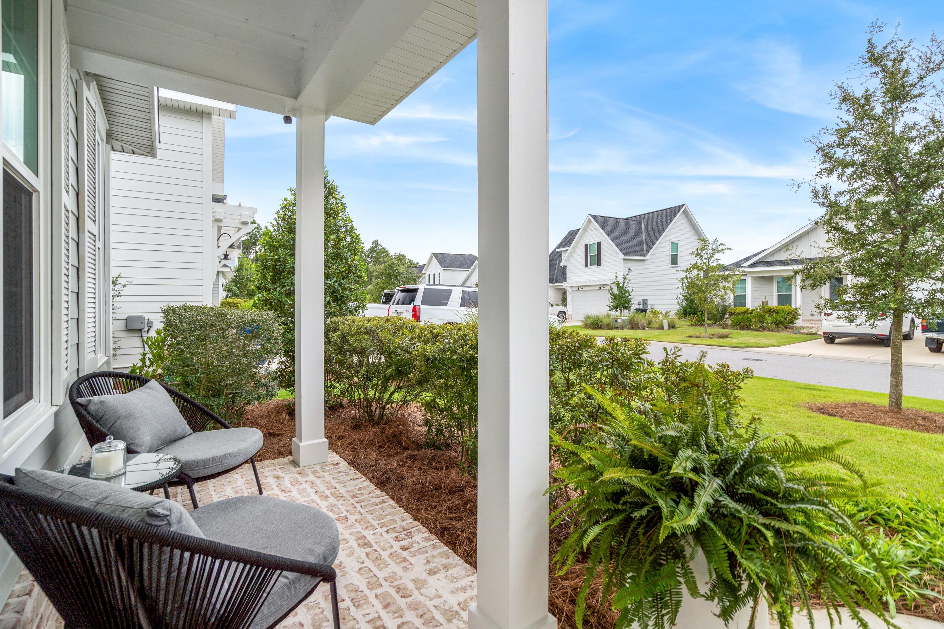 99 Roundwood Dr Inlet Beach Inlet Beach, FL 32461 - Photo 22 of 24 a view of balcony with furniture and garden