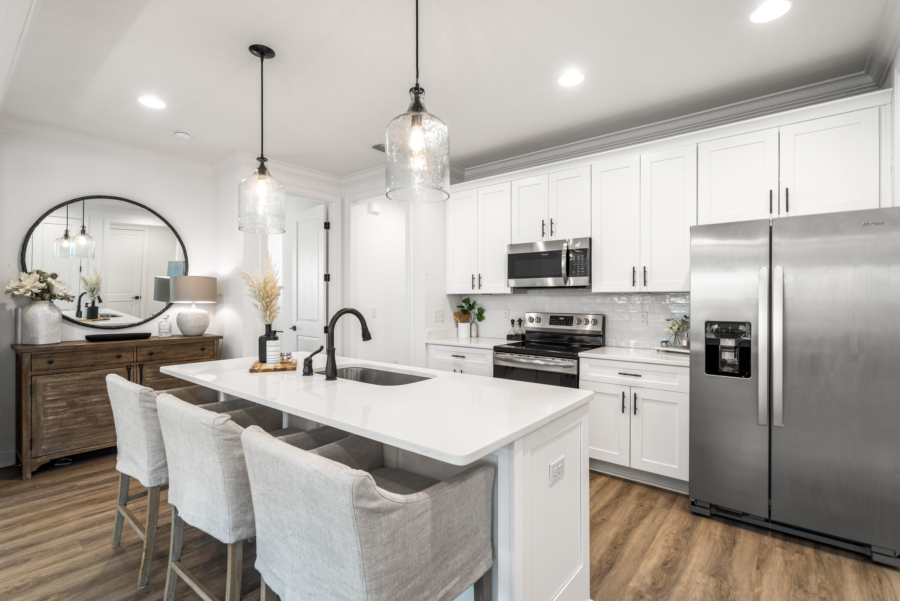 99 Roundwood Dr Inlet Beach Inlet Beach, FL 32461 - Photo 5 of 24 a kitchen with granite countertop a sink a counter space appliances and cabinets