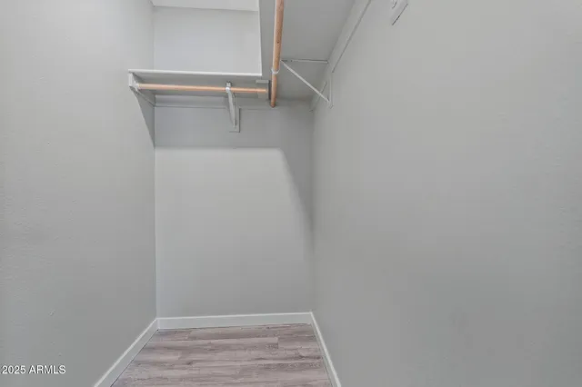 a view of small space with racks on the wall