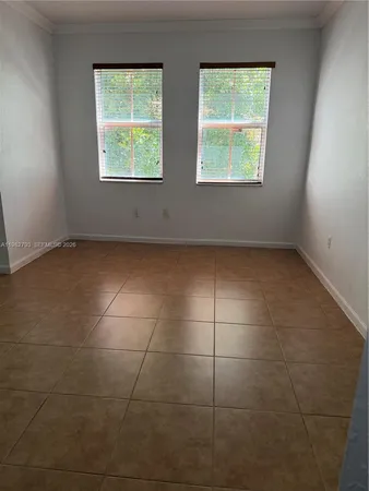 a view of a room that has a window in it