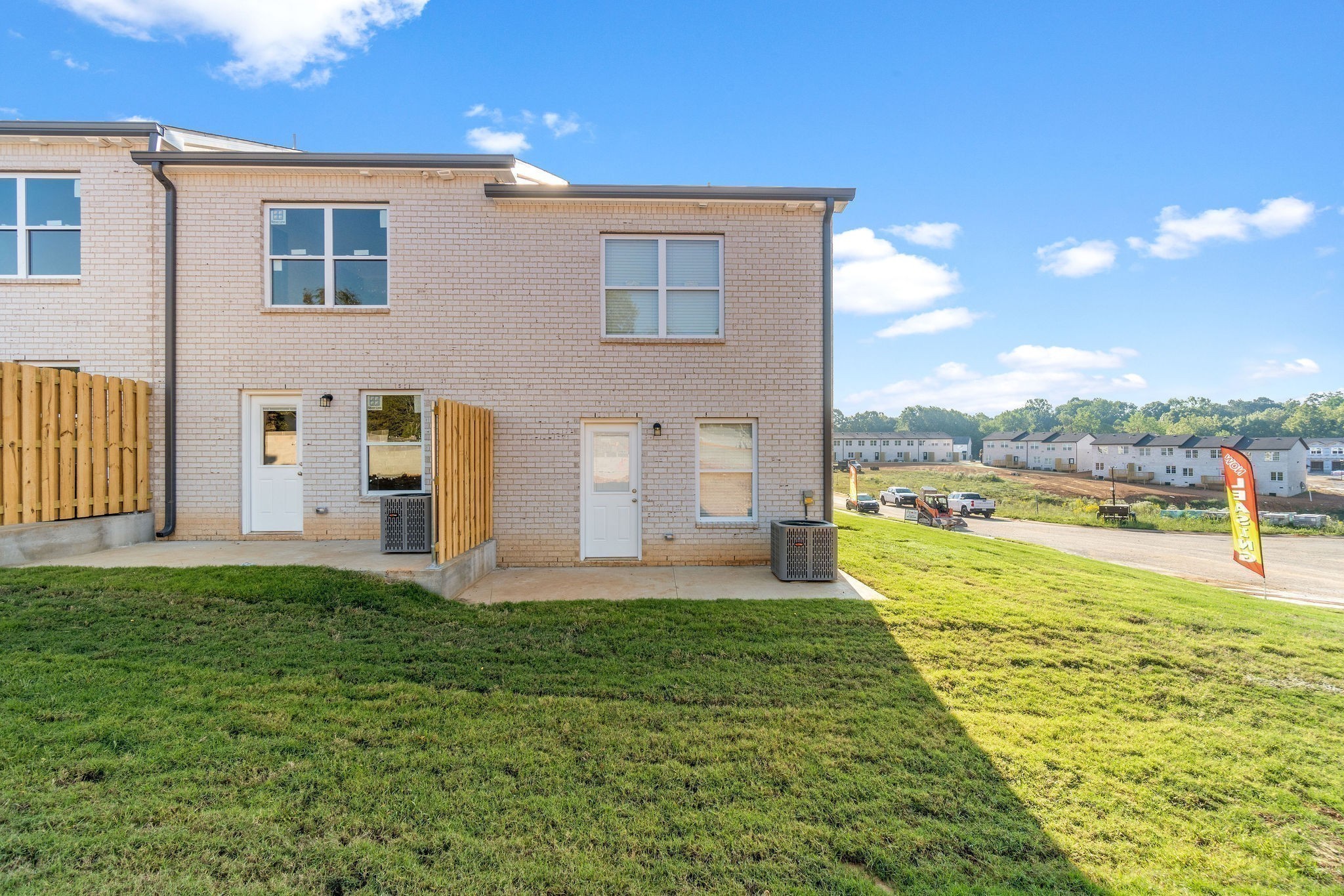 303 Longshadow Trail, Unit E Clarksville, TN 37043 - Photo 23 of 29 a view of a house with a yard and a large pool