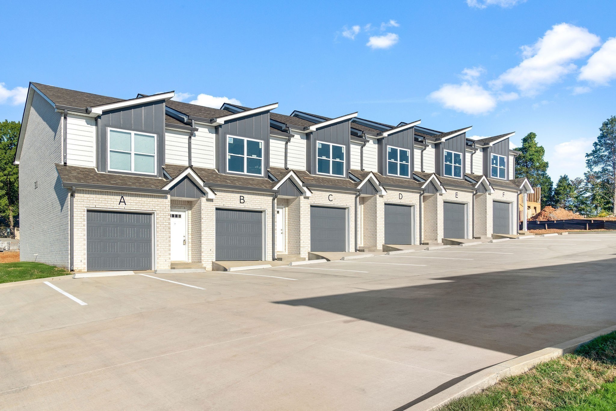 303 Longshadow Trail, Unit E Clarksville, TN 37043 - Photo 27 of 29 front view of a house with a street