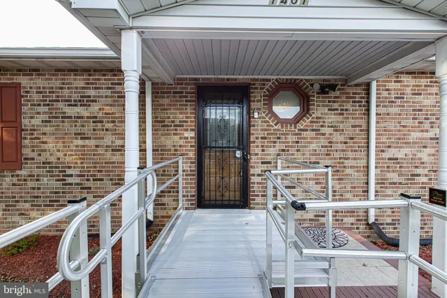 a front view of a house with wooden floor