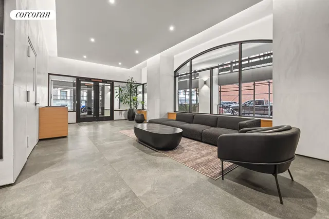 a bathroom with a sink toilet and mirror