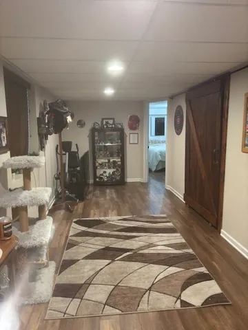 a view of a hallway with a livingroom