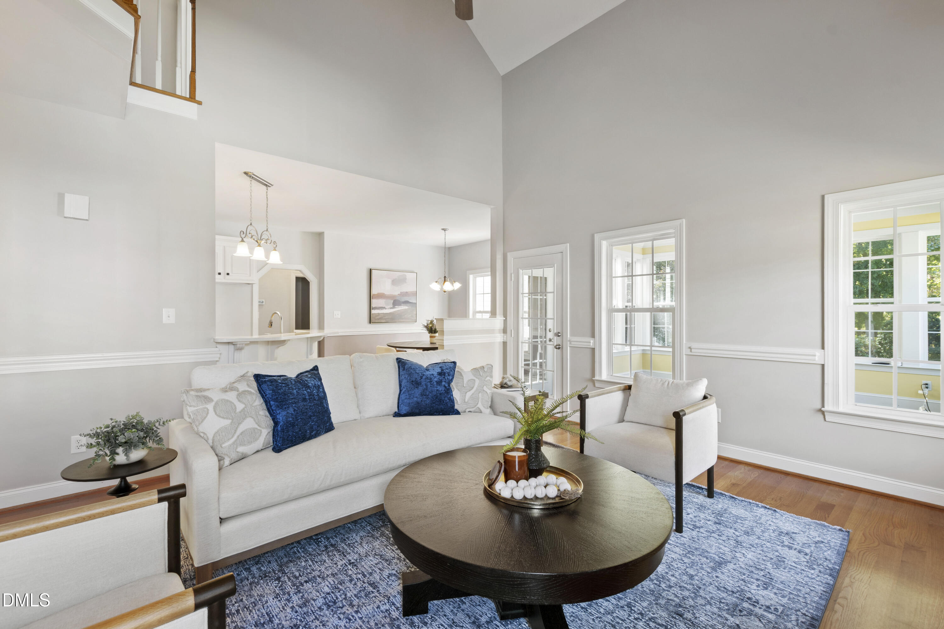 212 Fox Pen Drive Raleigh, NC 27603 - Photo 10 of 56 a living room with furniture and wooden floor
