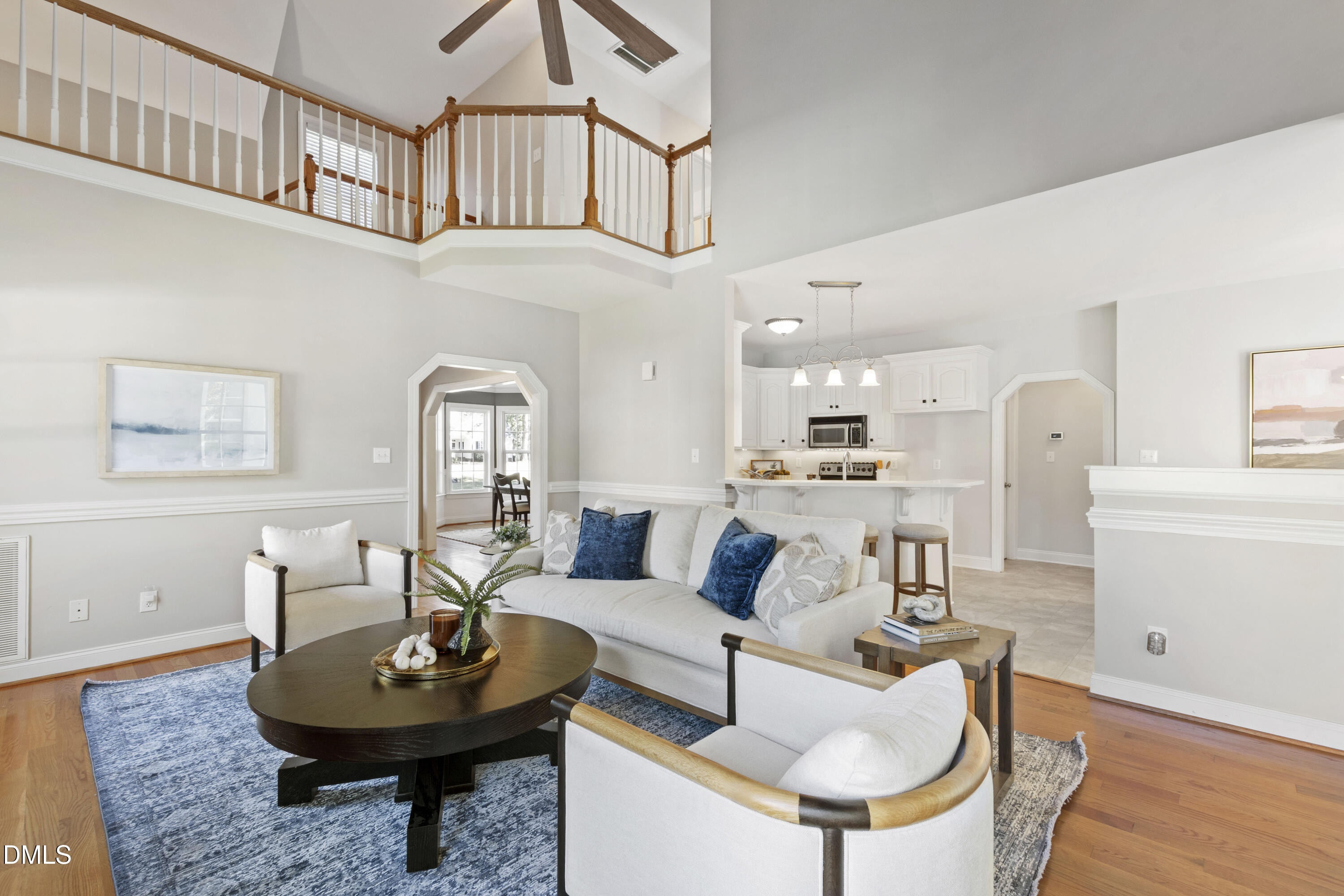 212 Fox Pen Drive Raleigh, NC 27603 - Photo 11 of 56 a living room with furniture and a table