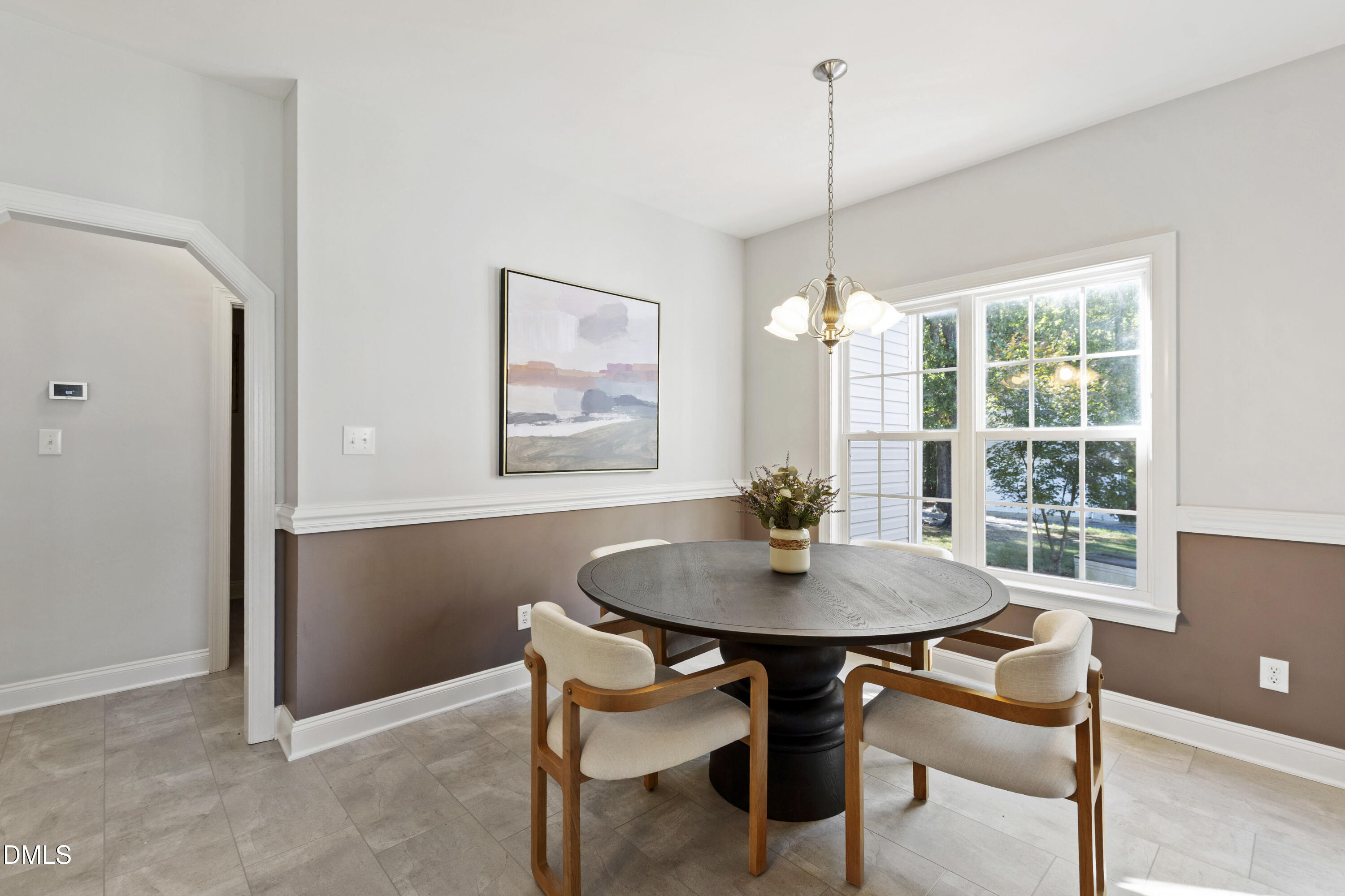 212 Fox Pen Drive Raleigh, NC 27603 - Photo 14 of 56 a dining room with furniture and window