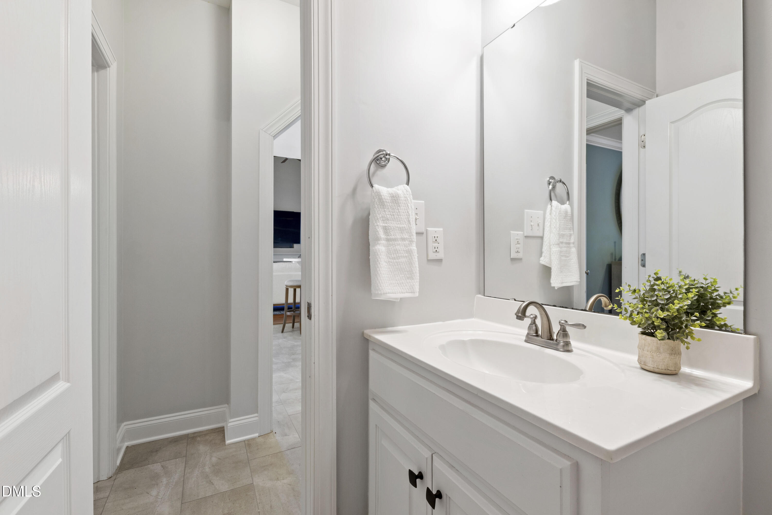 212 Fox Pen Drive Raleigh, NC 27603 - Photo 20 of 56 a bathroom with a sink and a mirror