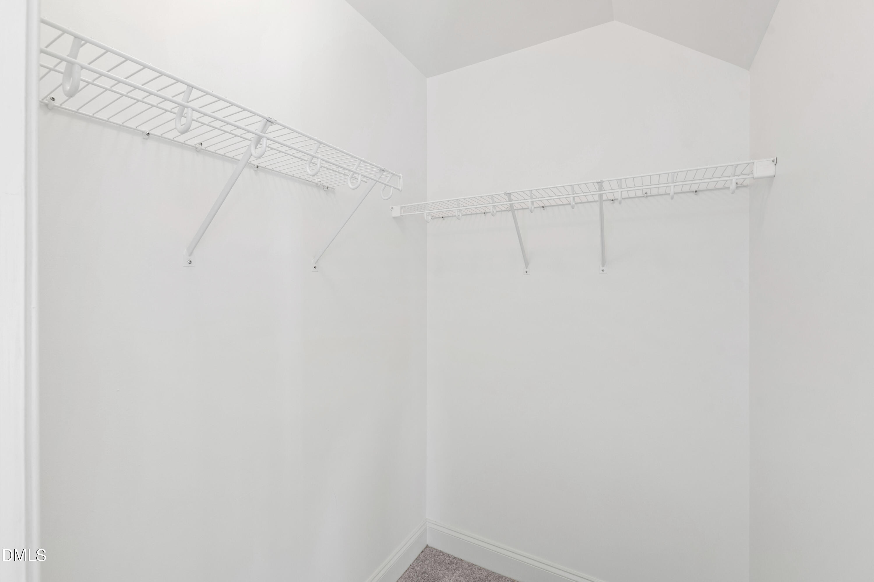212 Fox Pen Drive Raleigh, NC 27603 - Photo 29 of 56 a view of a room with racks on the wall