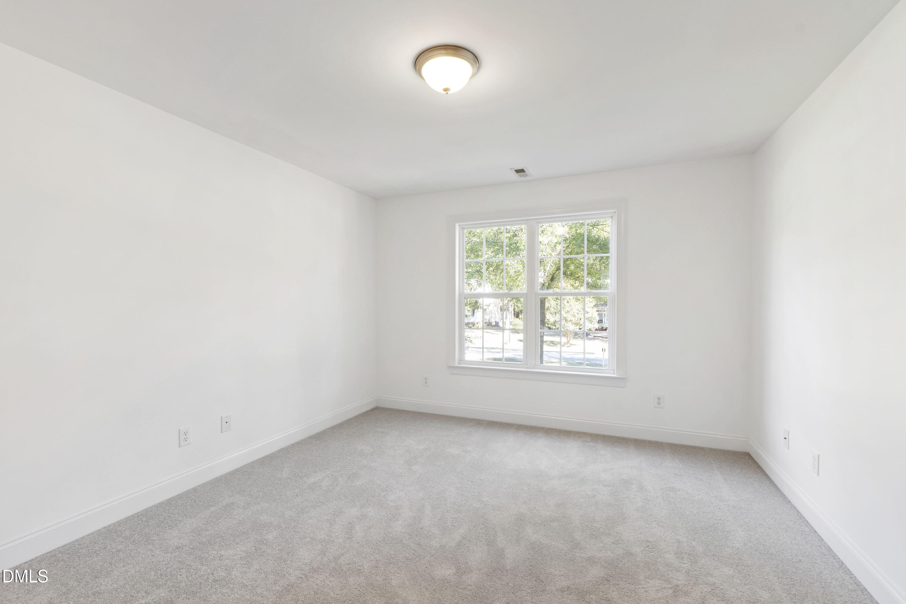 212 Fox Pen Drive Raleigh, NC 27603 - Photo 34 of 56 an empty room with a window