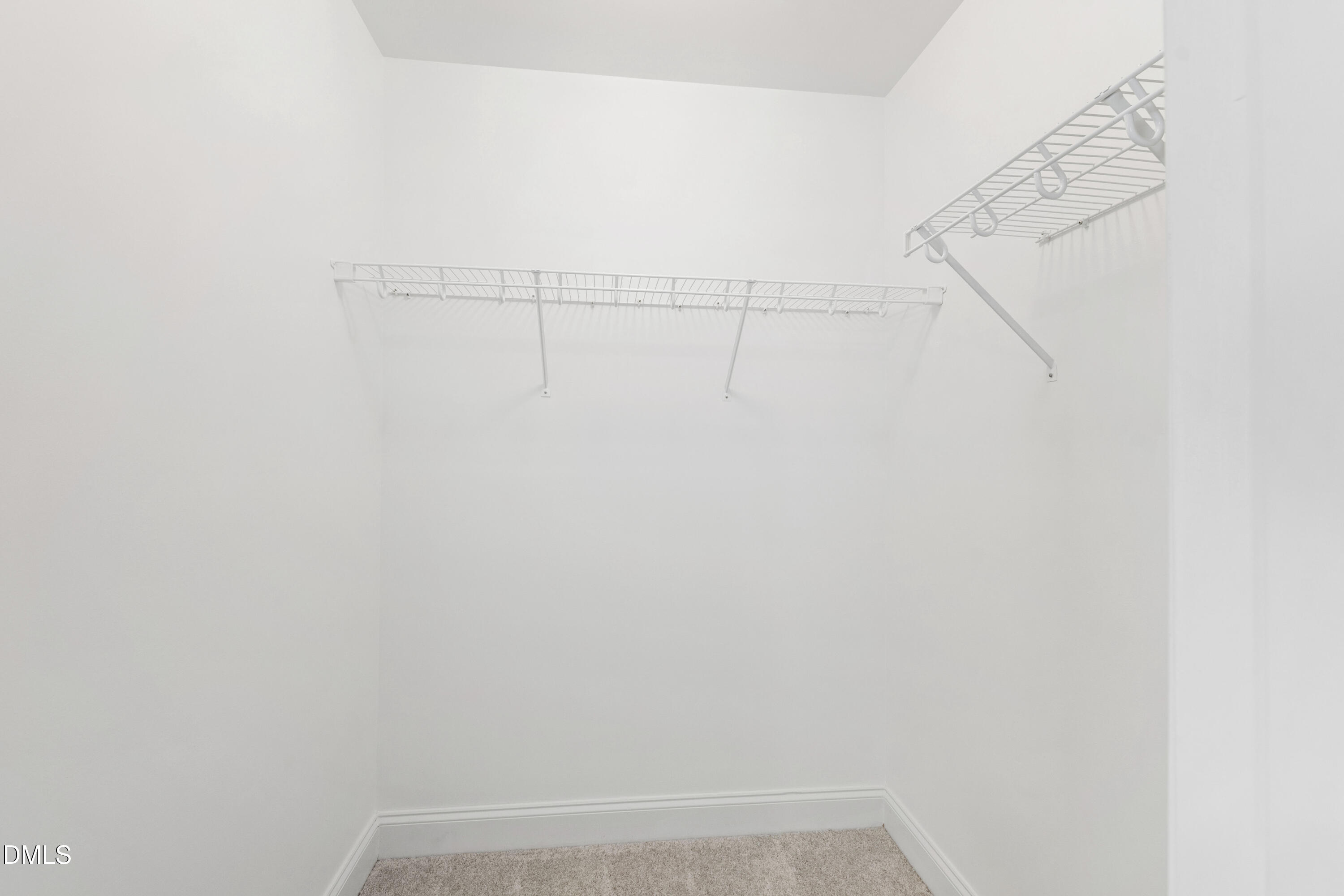 212 Fox Pen Drive Raleigh, NC 27603 - Photo 36 of 56 a view of small space with racks on the wall