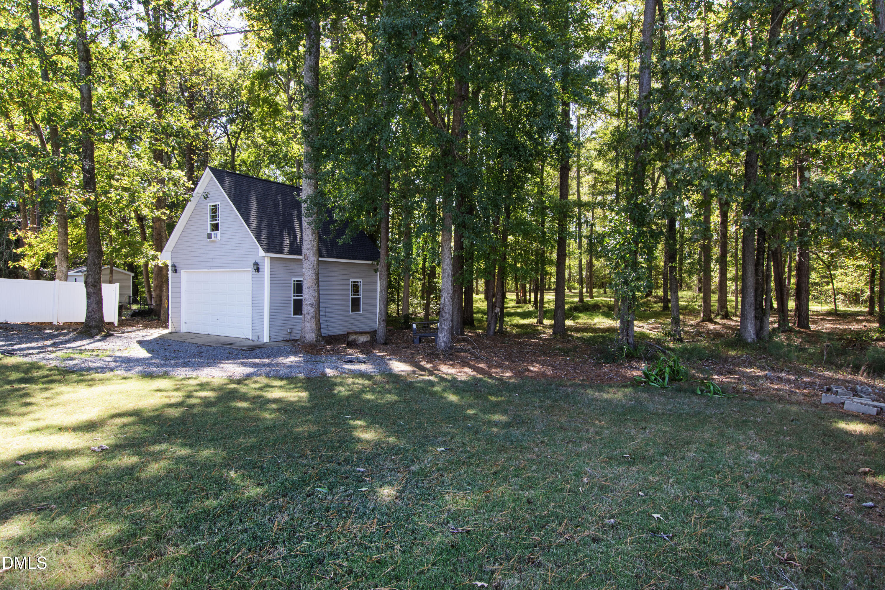 212 Fox Pen Drive Raleigh, NC 27603 - Photo 49 of 56 a view of a house with backyard and sitting area