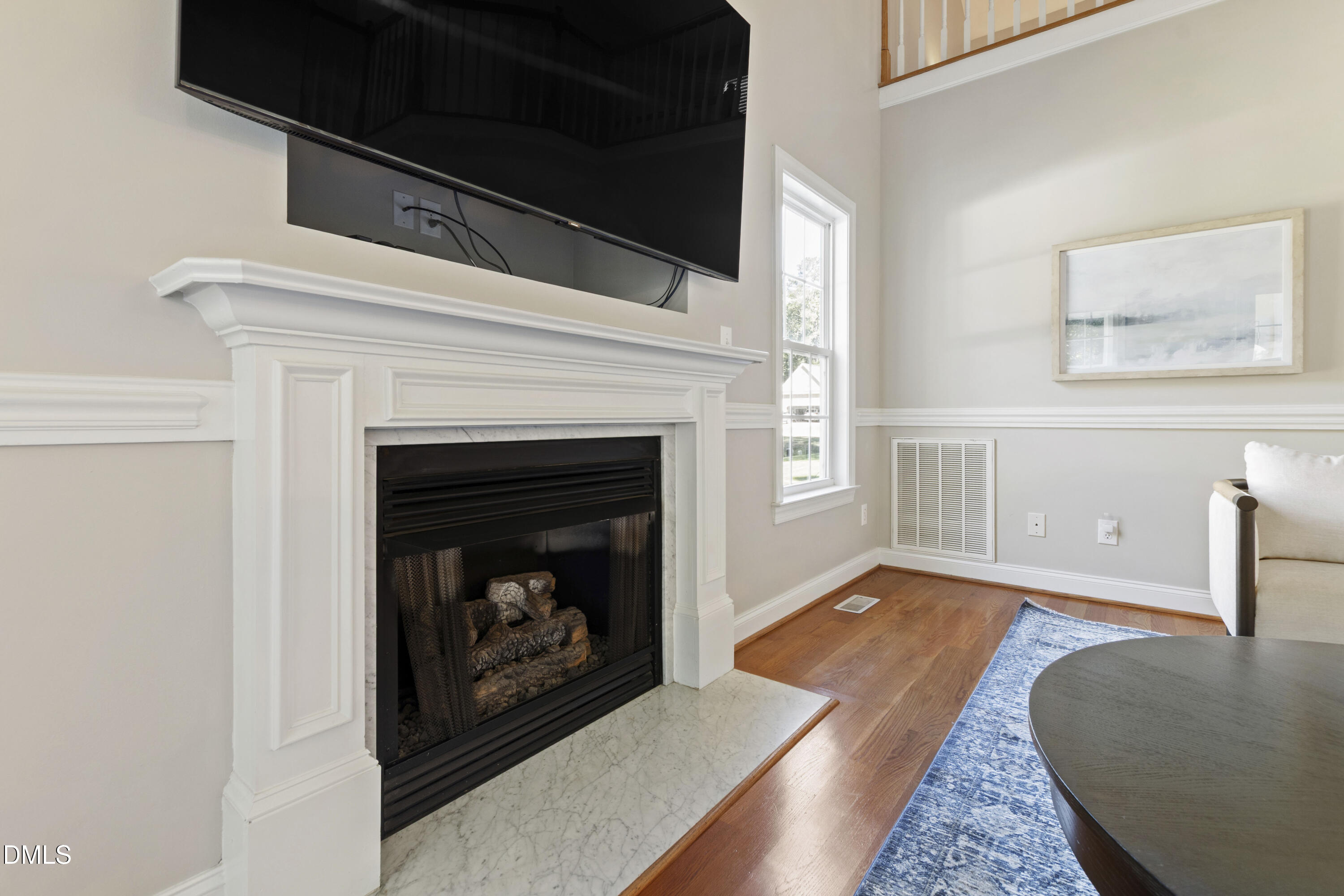 212 Fox Pen Drive Raleigh, NC 27603 - Photo 9 of 56 a living room with a fireplace