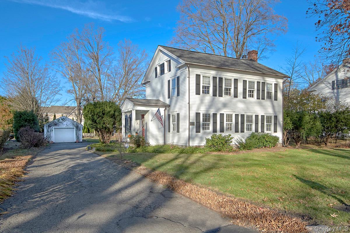 30 Bedford Road Armonk, NY 10504 - Photo 2 of 17 Front of home and detatched garage