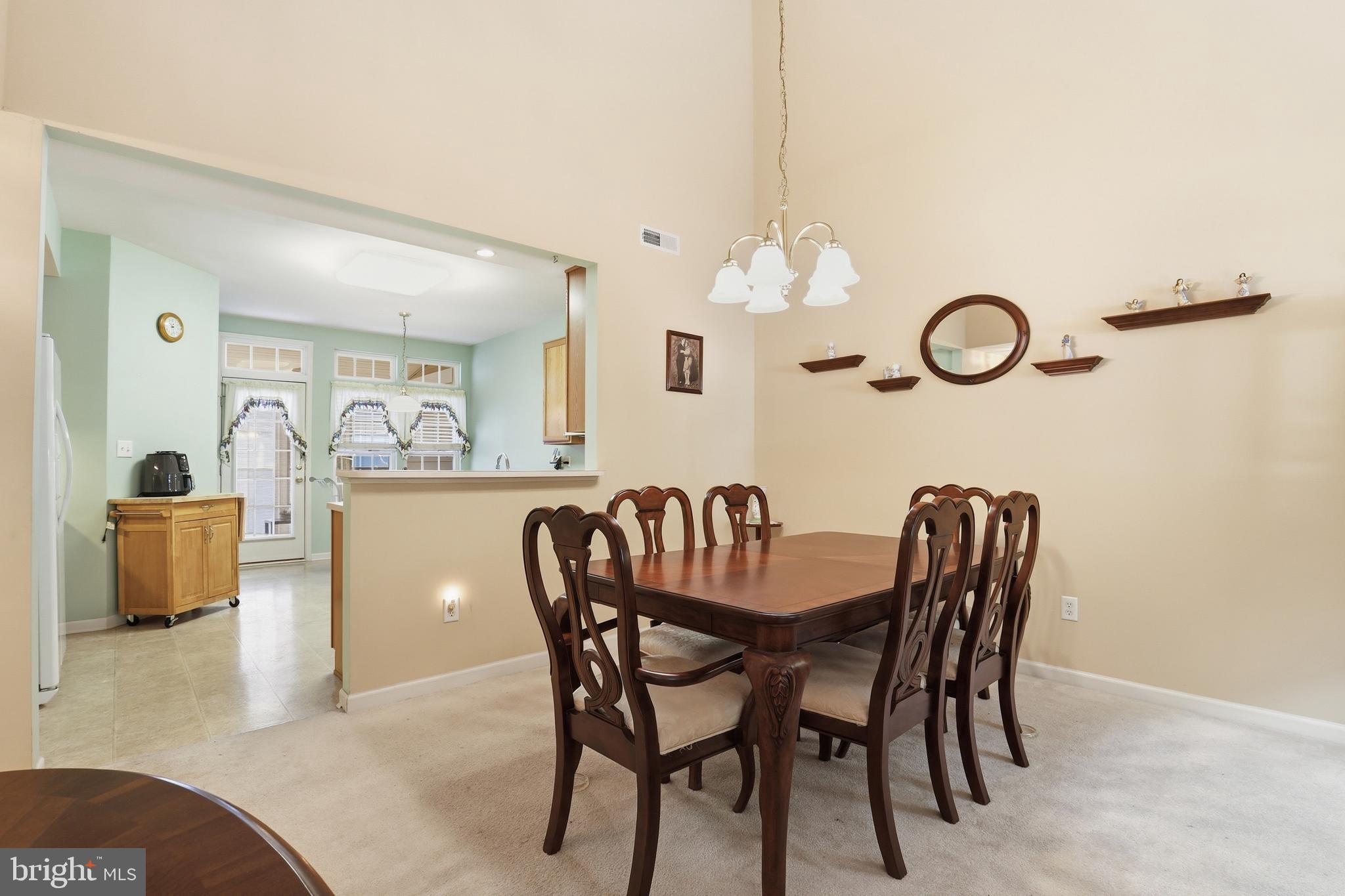 40 Brighton Street Ocean View, DE 19970 - Photo 9 of 38 a dining room with furniture and window