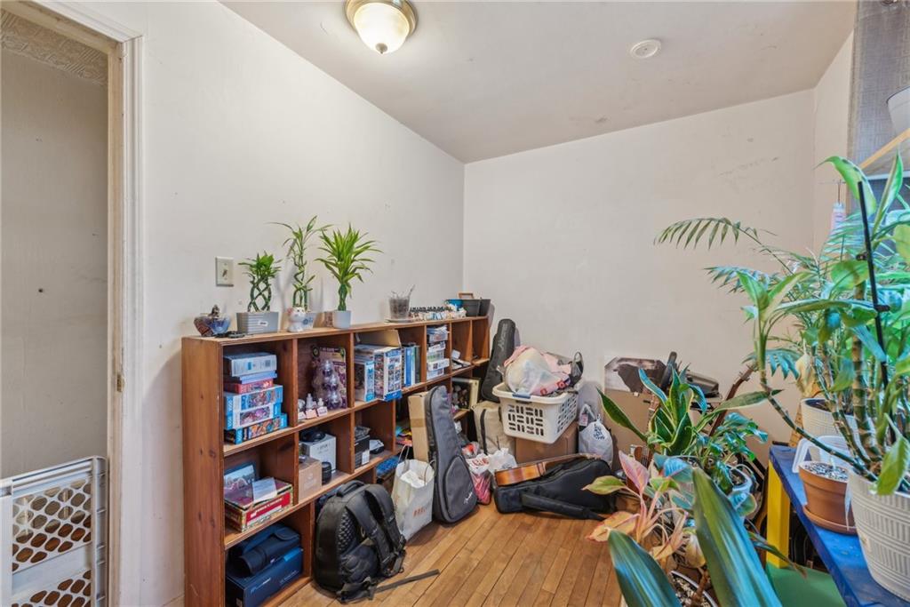 357 East McMurray Road Canonsburg, PA 15317 - Photo 16 of 21 a book shelf with books and a vase of flowers