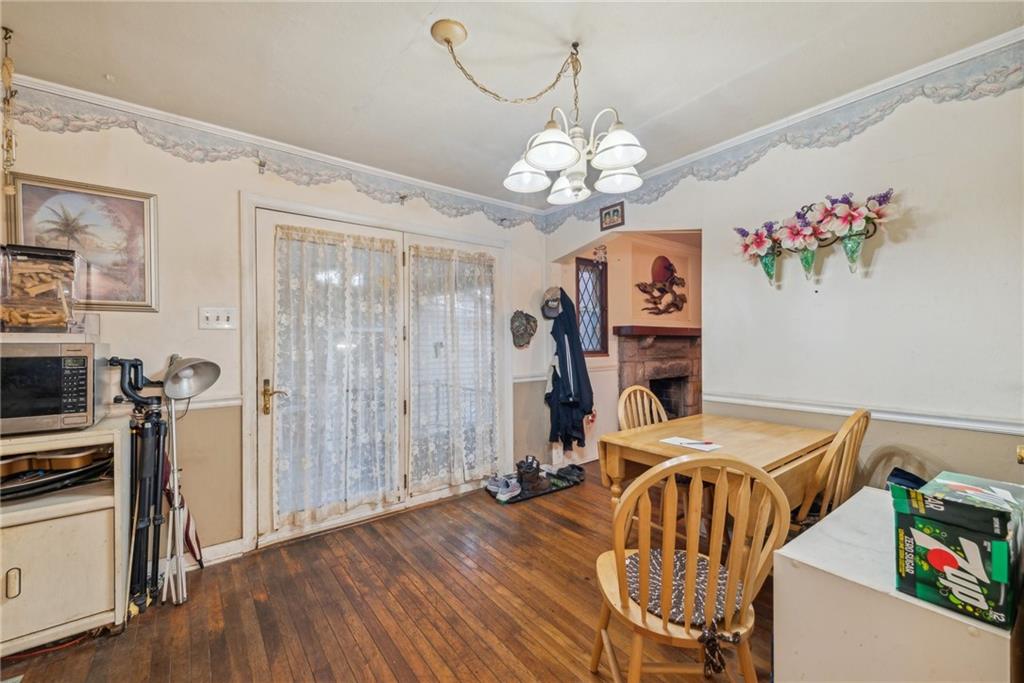 357 East McMurray Road Canonsburg, PA 15317 - Photo 17 of 21 a view of a dining room with furniture wooden floor and chandelier