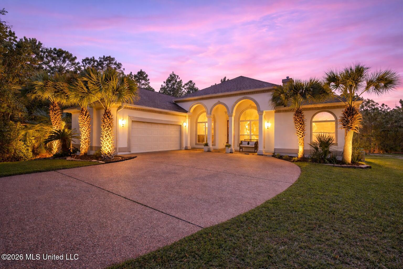 756 Troon Court Diamondhead, MS 39525 - Photo 2 of 55 Twilight glow