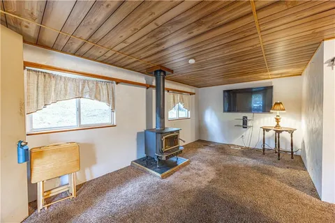 a view of a livingroom with furniture and front door