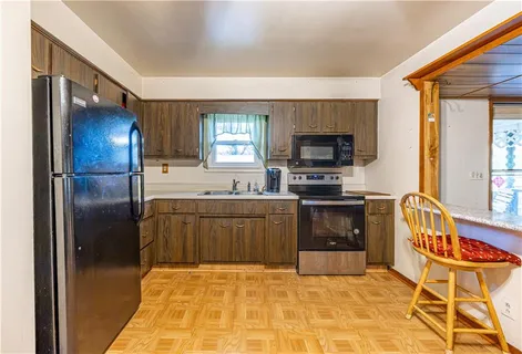 a bedroom with a bed and a table in it