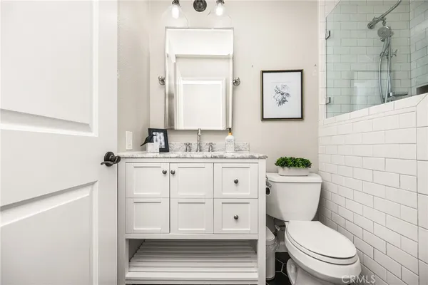 a bathroom with a bathtub and shower