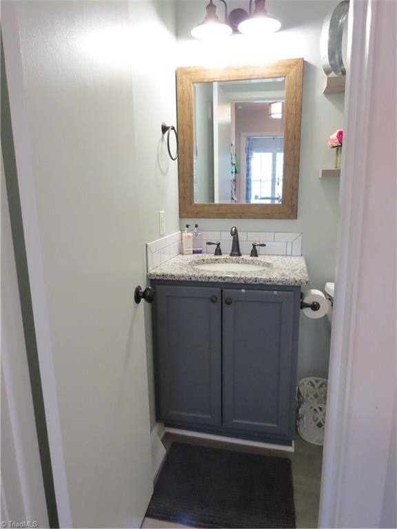 116 Longbow Road Reidsville, NC 27320 - Photo 15 of 20 Main Bathroom vanity with granite countertop.