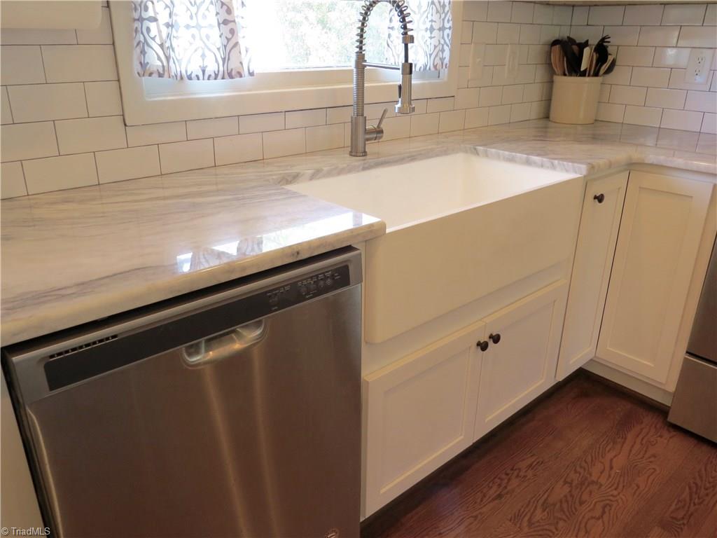 116 Longbow Road Reidsville, NC 27320 - Photo 5 of 20 beautiful tile backsplash and the new farm house sink