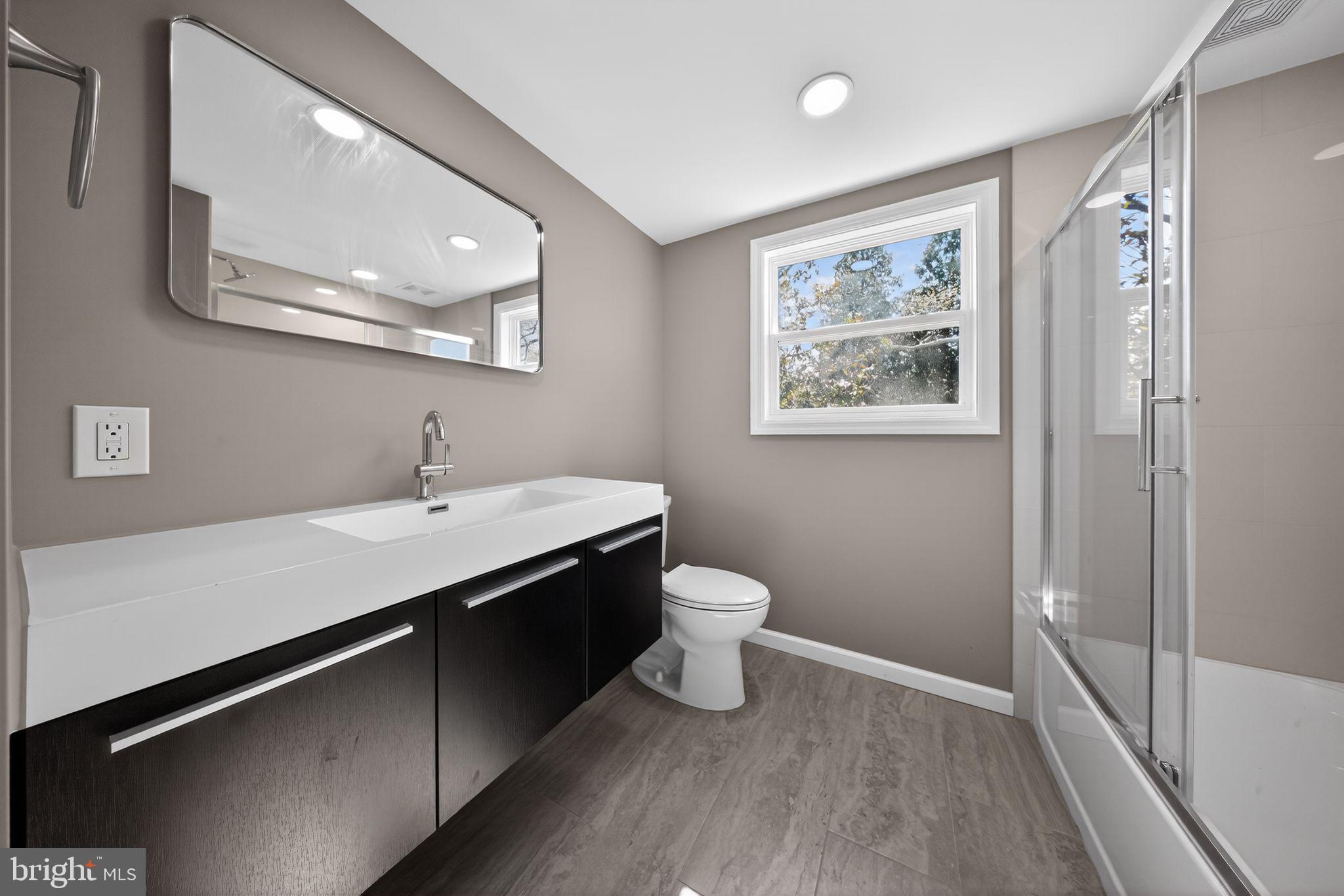 299 Kent Road Warminster, PA 18974 - Photo 16 of 33 Modern bathroom with natural light.
