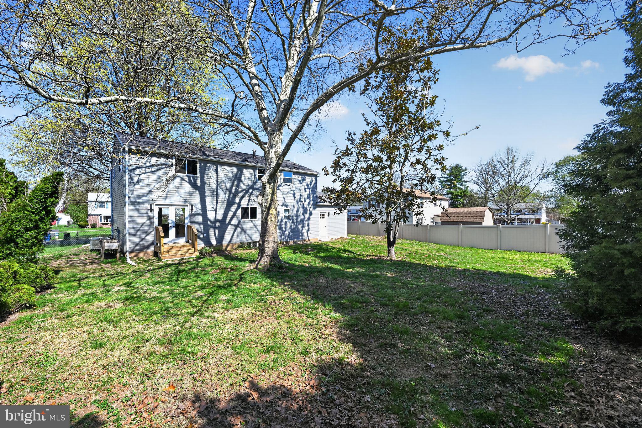 299 Kent Road Warminster, PA 18974 - Photo 31 of 33 Spacious backyard with serene greenery.
