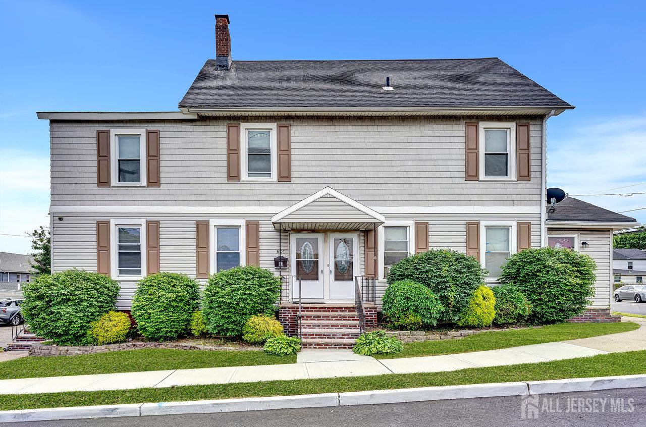 601 Ridgeway Avenue South Amboy, NJ 08879 - Photo 2 of 36 a front view of a house with a yard