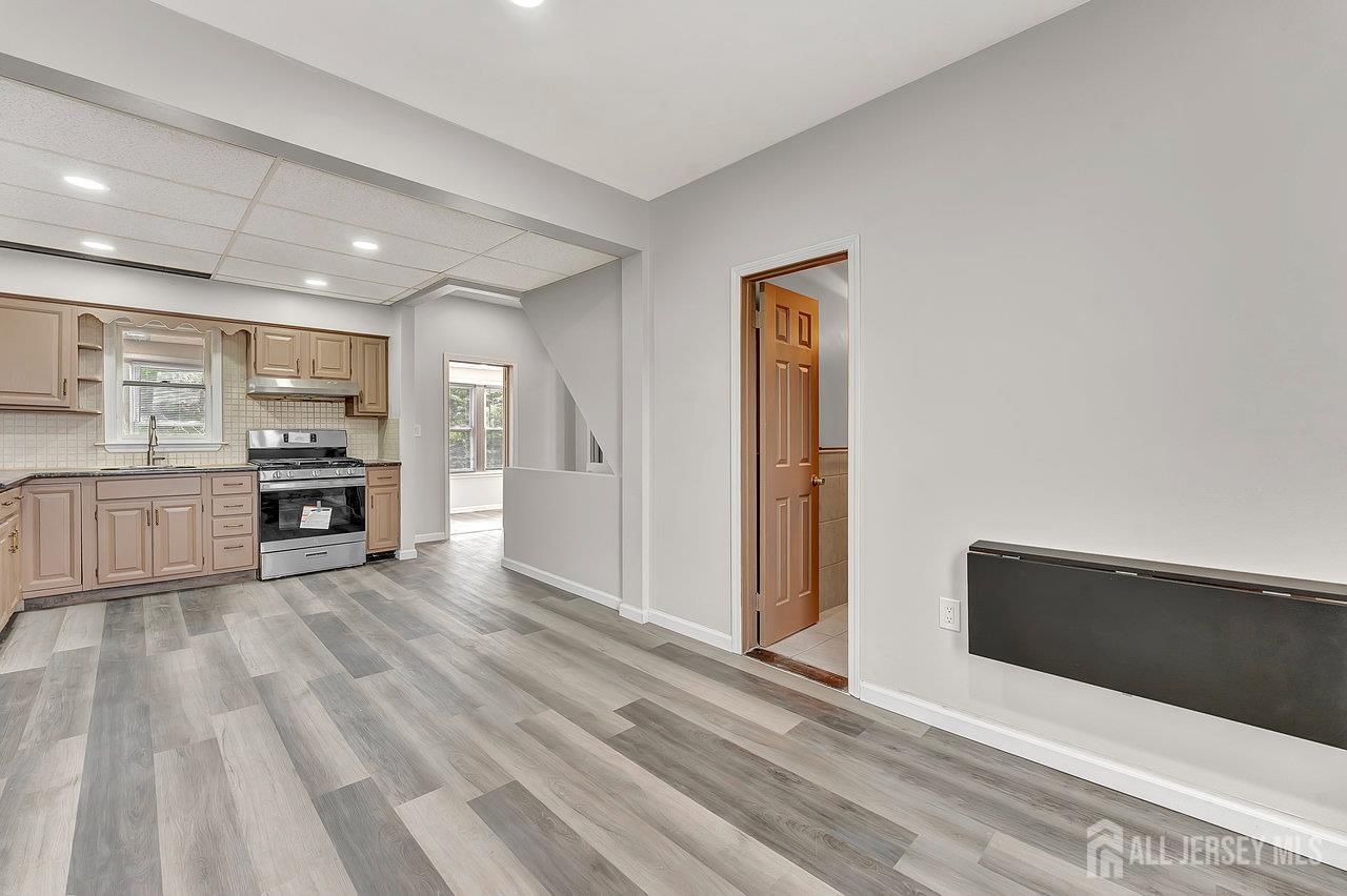 601 Ridgeway Avenue South Amboy, NJ 08879 - Photo 21 of 36 a view of a kitchen with a sink and a refrigerator