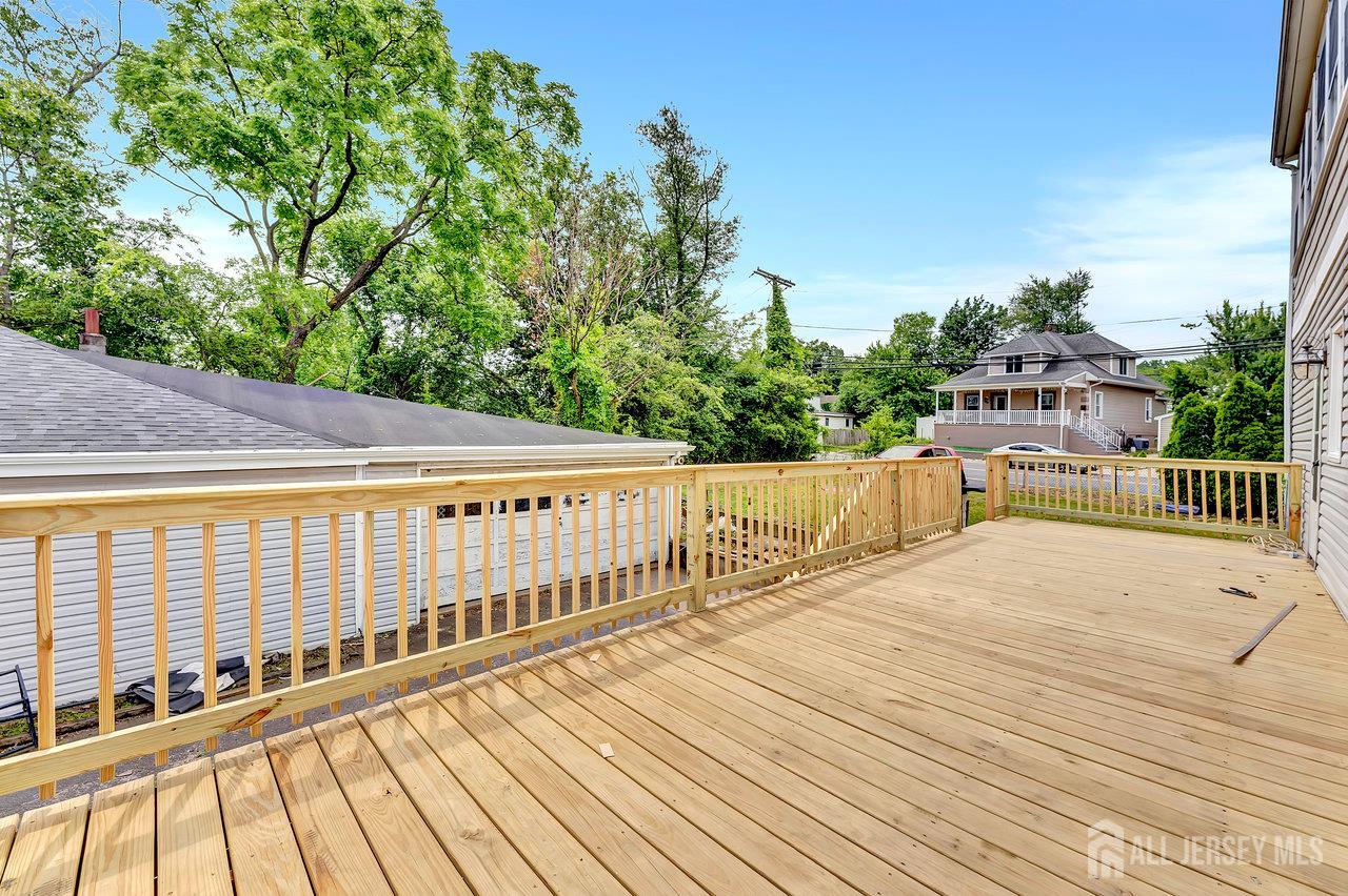601 Ridgeway Avenue South Amboy, NJ 08879 - Photo 32 of 36 a view of balcony with wooden floor and fence
