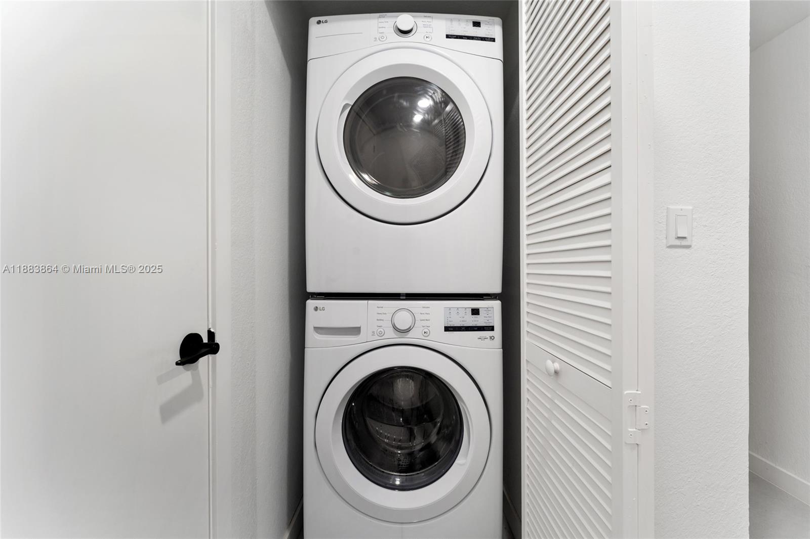 14590 Southwest 260th Street Homestead, FL 33032 - Photo 12 of 23 a utility room with dryer and washer