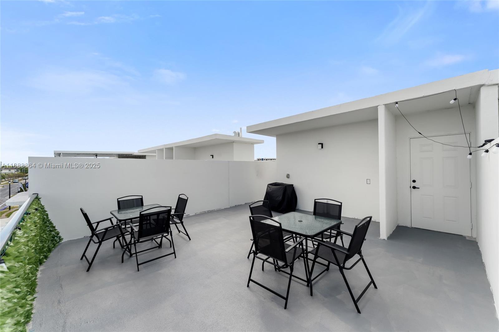 14590 Southwest 260th Street Homestead, FL 33032 - Photo 20 of 23 a view of a dining room with furniture and a potted plant