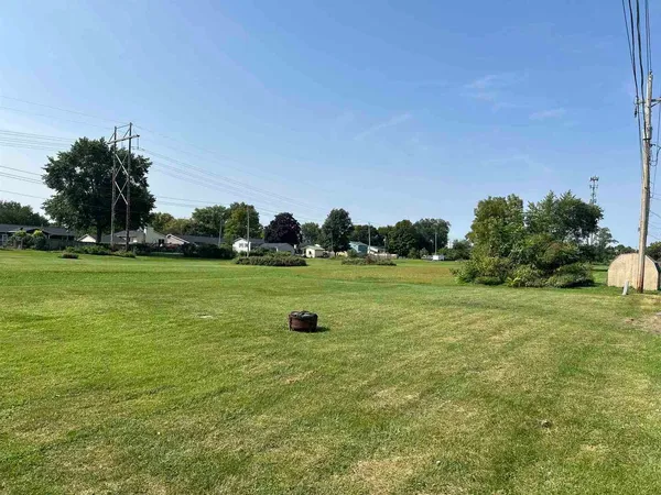 a view of a golf course with a garden
