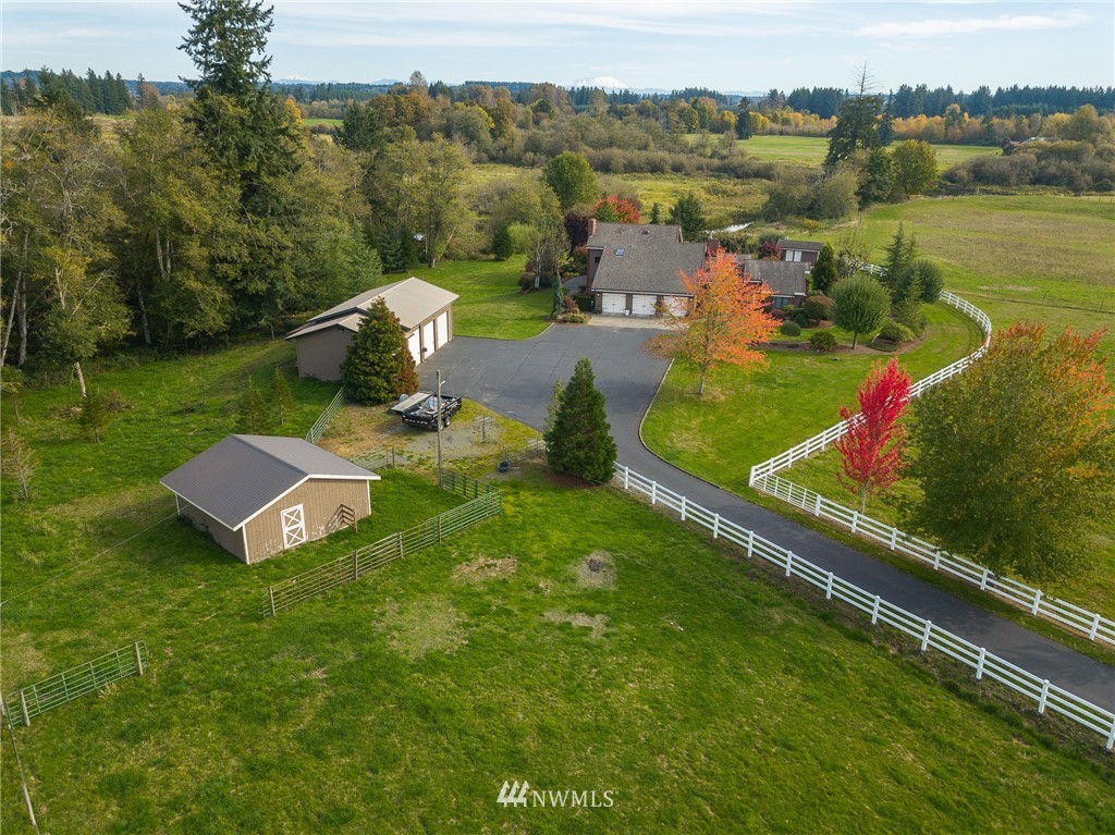 148 Taylor Road South Chehalis, WA 98532 - Photo 22 of 25 an aerial view of a house with a garden and lake view