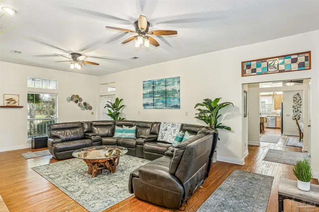 a kitchen with a refrigerator and a sink
