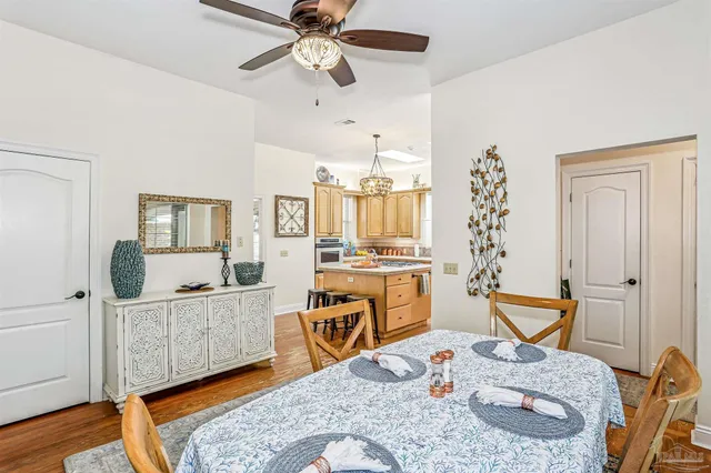 a kitchen with stainless steel appliances a stove sink and cabinets