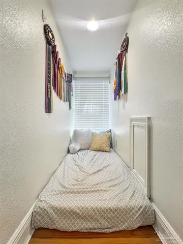 a view of a bathroom from the hallway