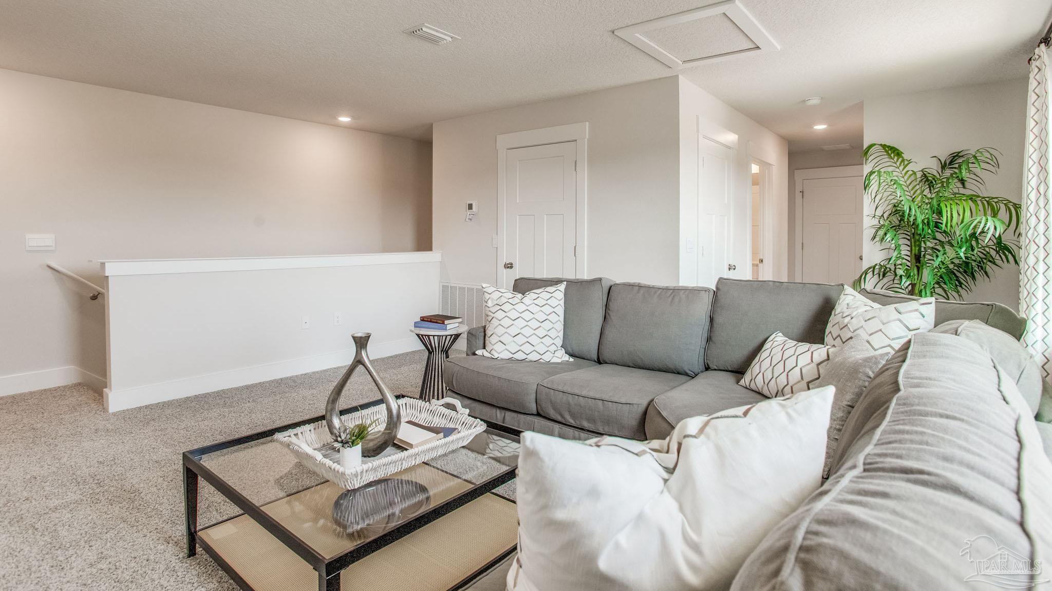 4631 Eider Road Pace, FL 32571 - Photo 17 of 46 a living room with furniture