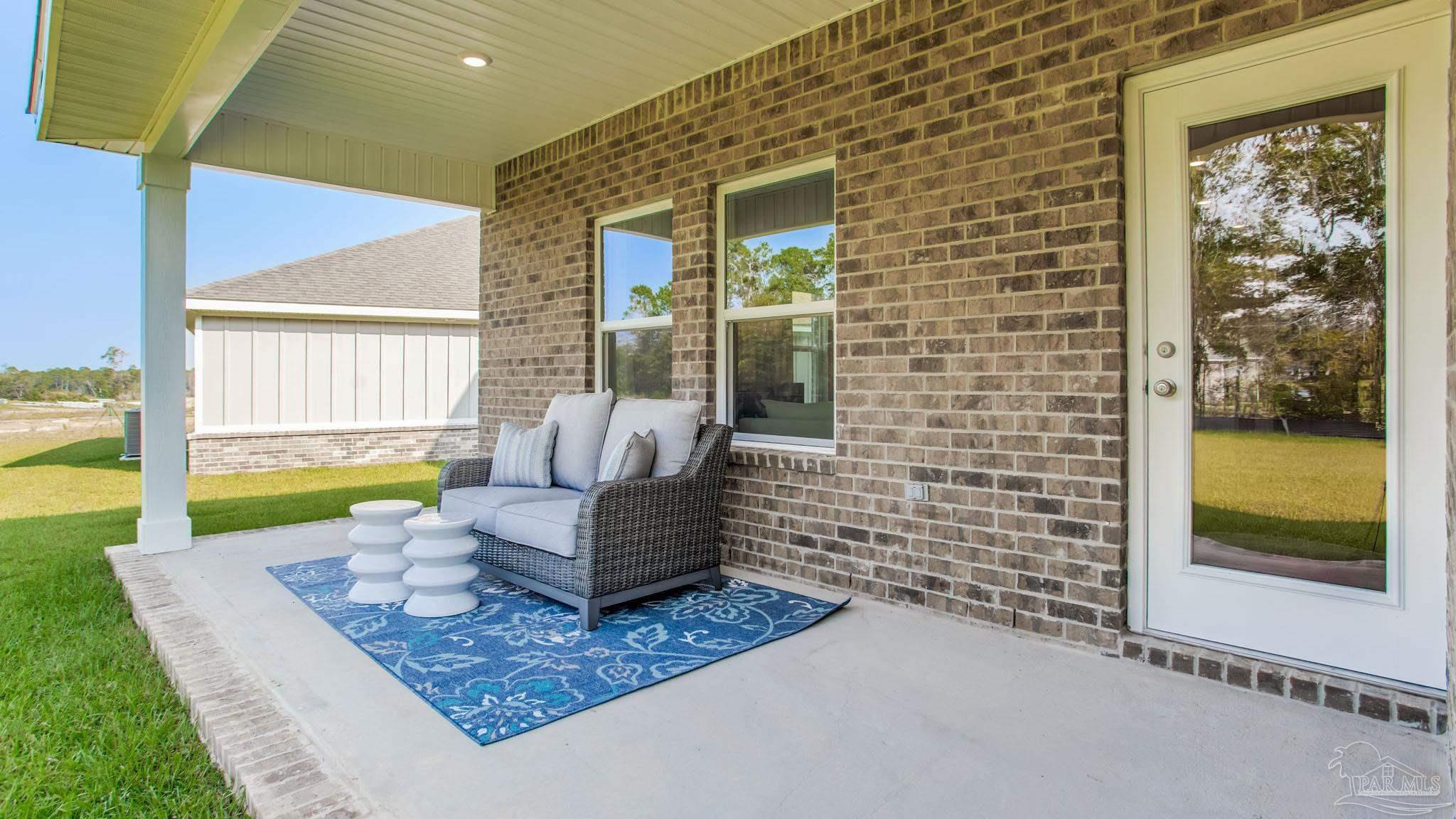 4631 Eider Road Pace, FL 32571 - Photo 3 of 46 a view of an outdoor space and living room