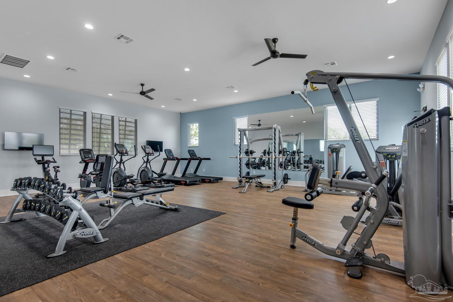 4631 Eider Road Pace, FL 32571 - Photo 43 of 46 a view of a room with gym equipment